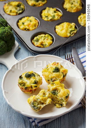 Vegetable muffins with broccoli and potatoes, vegetarian food. Vegetable muffins with broccoli and potatoes, vegetarian food. 58948046