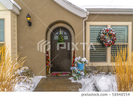 Entrance of home with holiday decorations in Utah 58948554