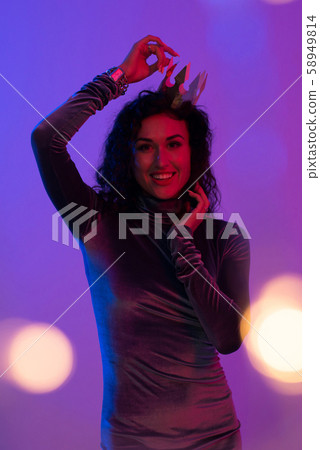 Young woman in pink blue neon lights. Creative colorful portrait 58949814