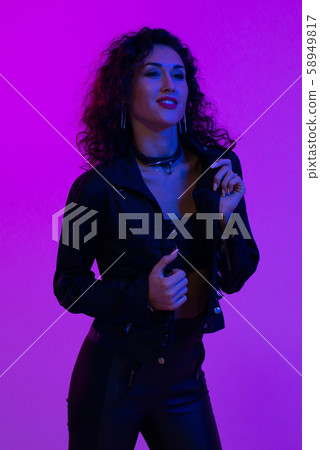 Young woman in pink blue neon lights. Creative colorful portrait Young woman in pink blue neon lights. Creative colorful portrait 58949817
