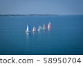 Sailing boats off coast compete in regatta 58950704