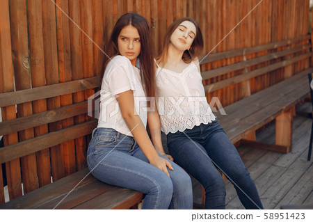 Two pretty girls in a summer park 58951423