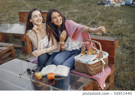 Two pretty girls in a summer park 58951440