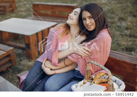 Two pretty girls in a summer park 58951442