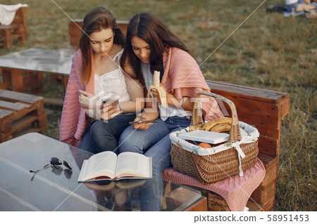Two pretty girls in a summer park 58951453
