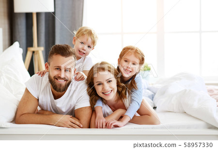 happy family mother, father and children laughing, 58957330
