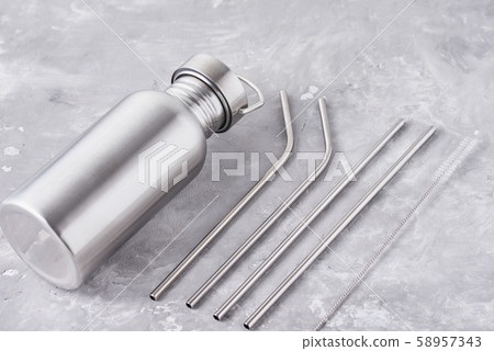Reusable plastic free items on a gray background. Reusable plastic free items on a gray background. 58957343