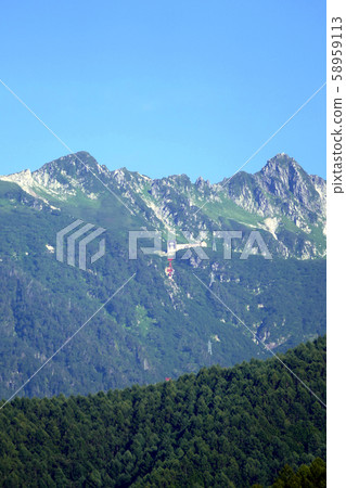 Senjojiki curl and ropeway seen from Komagaike Senjojiki curl and ropeway seen from Komagaike 58959113