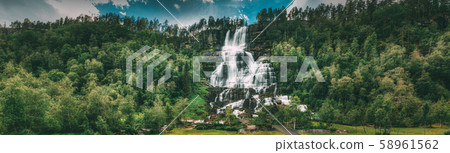 Voss, Hordaland, Norway. Waterfall Tvindefossen In Spring. Largest And Highest Waterfall Of Norway 58961562