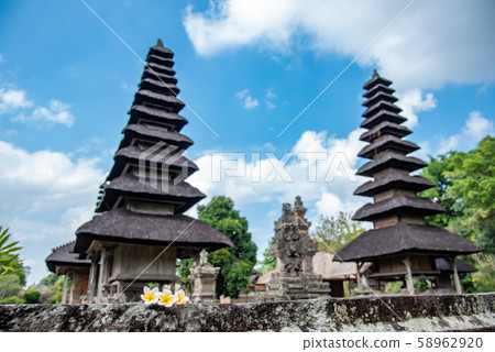 Bali's world heritage Merman of Taman Ayun Temple, Bali's leading flower, Frangipani Plumeria Bali's world heritage Merman of Taman Ayun Temple, Bali's leading flower, Frangipani Plumeria 58962920
