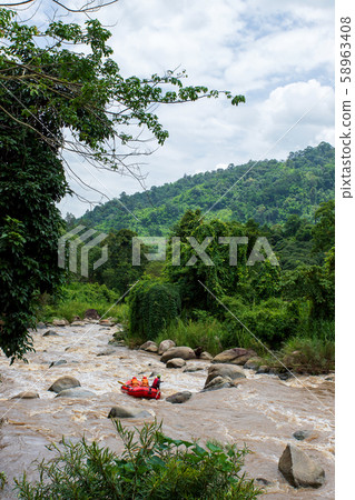 Rafting team , summer extreme water sport. Group 58963408