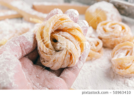 pasta with pasta ingredients on the dark wooden 58963410