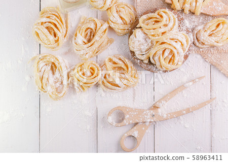 pasta with pasta ingredients on the dark wooden 58963411