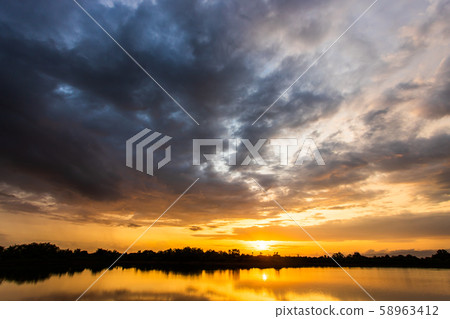 colorful dramatic sky with cloud at sunset 58963412