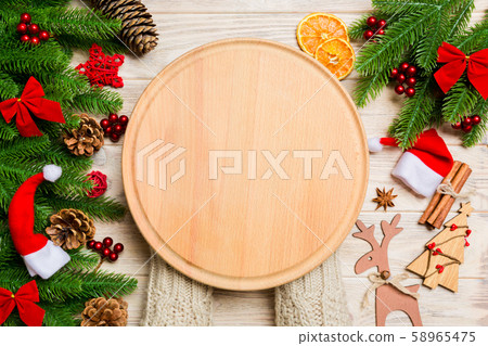 Top view of female hand holding a plate on holiday Top view of female hand holding a plate on holiday 58965475