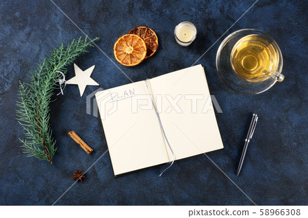 New Year's resolutions, flat lay overhead shot with the handwritten word plan and copy space, on a 58966308