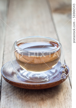 Herbal lavender tea in oriental glass cup 58966543