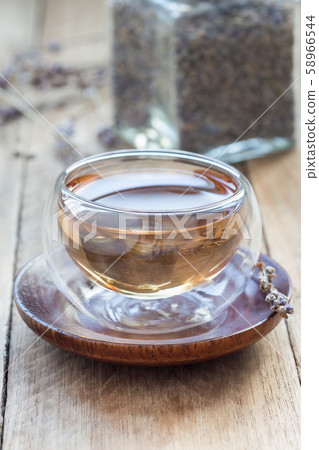 Healthy herbal lavender tea in oriental glass cup Healthy herbal lavender tea in oriental glass cup 58966544