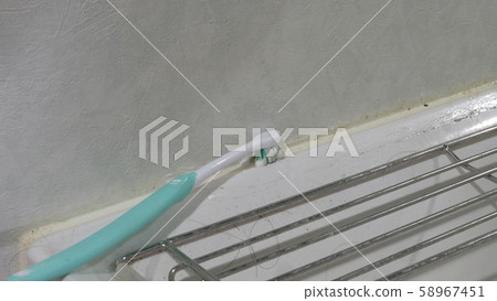 Cleaning the washroom Cleaning the washroom 58967451