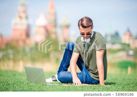 Happy young urban man enjoy his break in the city 58969186