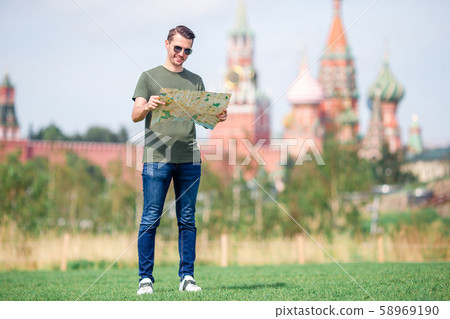 Happy young urban man in european city. Happy young urban man in european city. 58969190