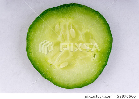 Sliced cucumber isolated on white background 58970660