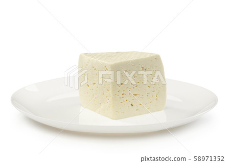 Delicious cheese close up isolated on white studio background Delicious cheese close up isolated on white studio background 58971352