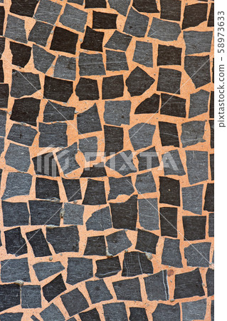 Mosaic flooring of multicolored small stones Mosaic flooring of multicolored small stones 58973633