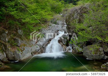 Photographing the flow of the Ojiragawa Canyon, one of the 100 best waters in Japan in Hakushu-cho, Hokuto City, Yamanashi Prefecture, during Golden Week 58973826