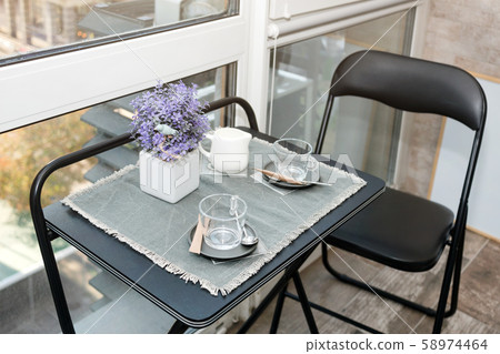 Empty coffee cups on the balcony with sunlight in Empty coffee cups on the balcony with sunlight in 58974464