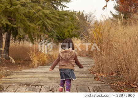 A girl walking 58975900