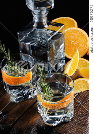 Classic Dry Gin with tonic and orange zest 58976272