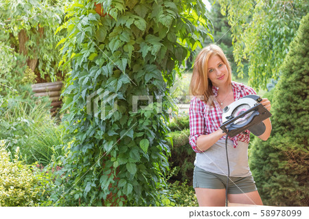 Attractive young woman is showing circular hand 58978099
