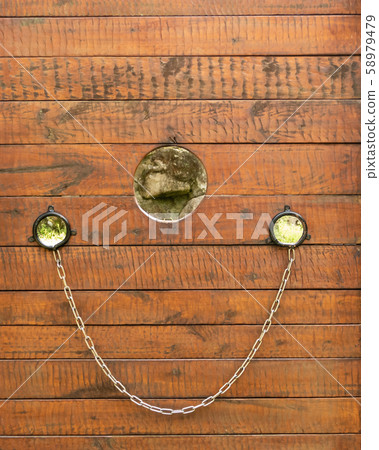 Old style pillory stockade for prisoners 58979479