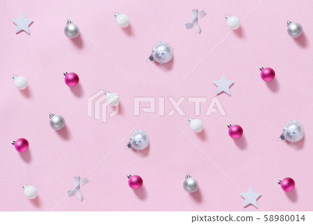 Christmas decorations  on a light pink background 58980014