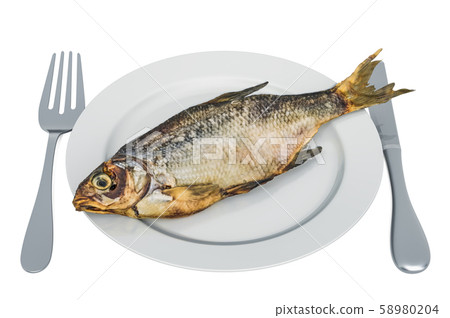 Salty dry fish on plate with fork and knife Salty dry fish on plate with fork and knife 58980204