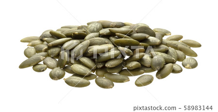 Peeled pumpkin seeds isolated on white background with clipping path 58983144