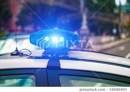 Close-up of flashing lights on a police car. Close-up of flashing lights on a police car. 58986903