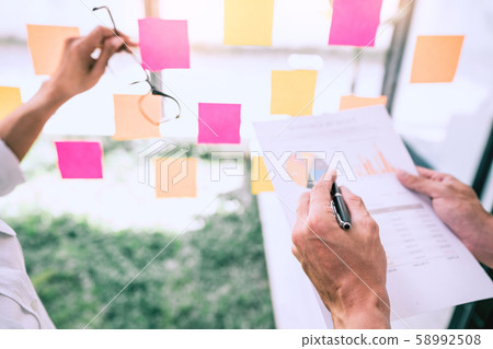 Business people meeting at office and use sticky Business people meeting at office and use sticky 58992508