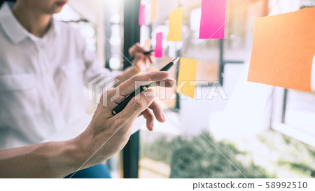 Business people meeting at office and use sticky 58992510