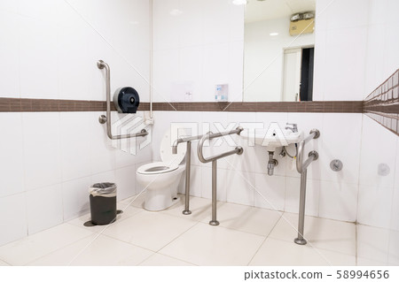An disabled toilet An disabled toilet 58994656