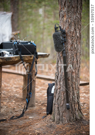 Movie equipment is standing in the forest Movie equipment is standing in the forest 58997037