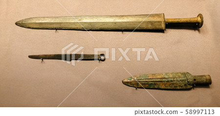Bronze sword, knife and spear head from Qin Emperor mausoleum museum in Xian, China  58997113