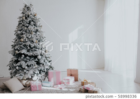 White Christmas tree decorating new year gifts Interior holiday winter White Christmas tree decorating new year gifts Interior holiday winter 58998336