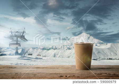 Single tea or coffee mug and landscape of mountains on background Single tea or coffee mug and landscape of mountains on background 59000979