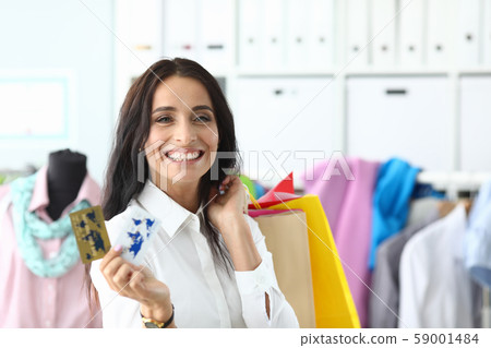 Rich lady in shop 59001484