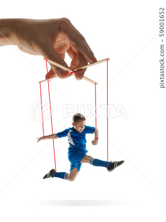 Boy like a puppet in somebodies hands. Concept of manipulation Boy like a puppet in somebodies hands. Concept of manipulation 59001652