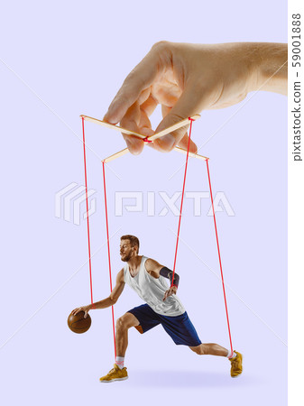 Man like a puppet in somebodies hands. Concept of manipulation Man like a puppet in somebodies hands. Concept of manipulation 59001888