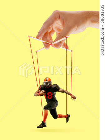 Man like a puppet in somebodies hands. Concept of manipulation 59001935