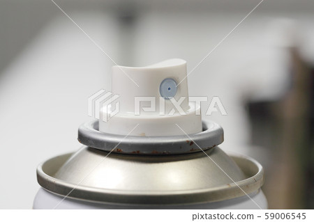 Aerosol spray cans nozzle close up Aerosol spray cans nozzle close up 59006545